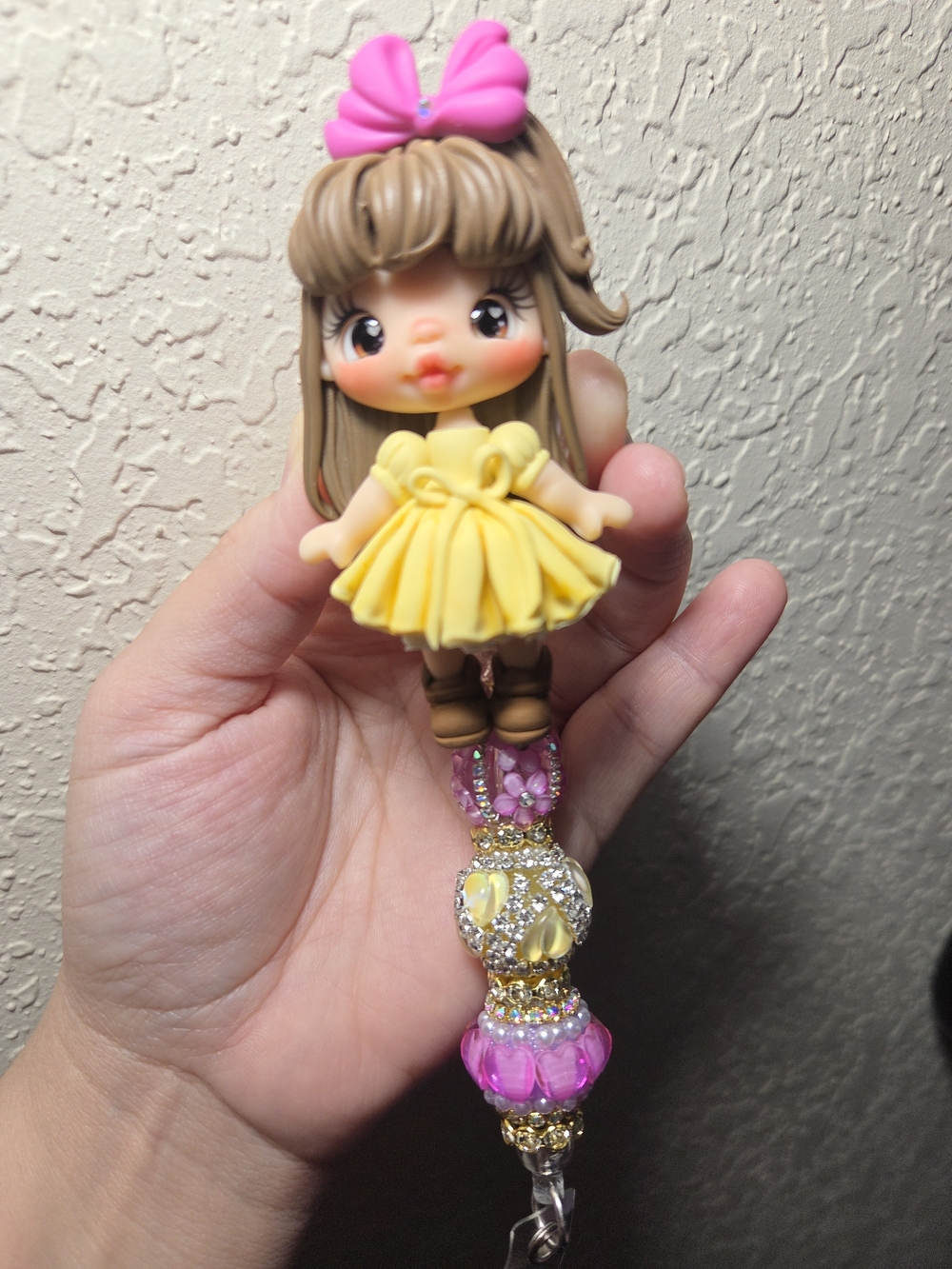 Cute Yellow Dress Clay Doll Badge Reel with Pink Bow